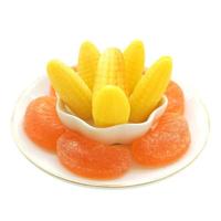 Bonbons gélifiés en vrac saveur maïs et orange, faits avec 100 % de jus naturel, emballés individuellement pour les snack-bars et les cafés