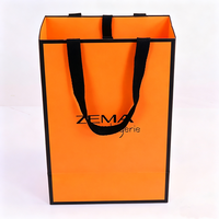 Sacs en papier orange de haute qualité pour vêtements, avec ruban gros-grain imprimé, logo personnalisé, taille et couleur sur mesure, grande capacité, emballage cadeau