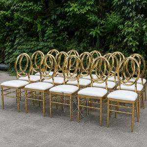 Chaise de mariage en acier inoxydable doré à dossier ovale emboîtable avec coussin blanc pour événements de mariage et banquets - Sièges événementiels - Product Image 1