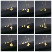 Nouvel ensemble de bijoux fantaisie en acier inoxydable, motif fleur libellule, personnalisé et simple, comprenant des boucles d'oreilles et un collier pour la vie quotidienne des femmes
