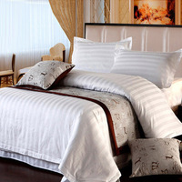 Parure de lit de luxe hôtelière 100% Coton 300TC tissé jetable toutes saisons moderne quatre pièces 1cm/3cm satin personnalisé Grade A 2.0m