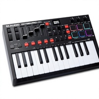 Controlador de Teclado MIDI USB M-AUDIO Oxygen Pro Mini de 32 Teclas con Pads Táctiles Capacitivos, Faders y Perillas Asignables, Nativo USB