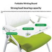 Chaise de formation pliable minimaliste avec tableau d'écriture en maille, rotative et empilable, pour salles de conférence et instituts de formation