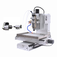 Routeur CNC 6040, machine de gravure verticale 2,2 kW avec 4 axes et 5 axes pour la sculpture 3D sur métal et bois, état neuf et d'occasion
