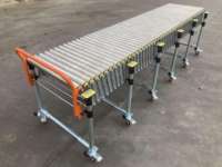 Table de convoyage à rouleaux télescopique motorisée à haute efficacité pour le chargement et le déchargement de conteneurs