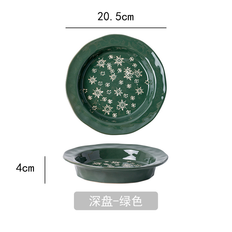 Plato verde con copos de nieve navideños