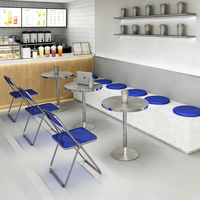 Modernes Casual-Restaurant-Möbelset, einschließlich Esstische, Klappstühle und Doppelhocker