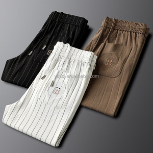Pantaloni Casual in cotone <span class=keywords><strong>a</strong></span> <span class=keywords><strong>righe</strong></span> da uomo di lusso leggero pantaloni sportivi in cotone <span class=keywords><strong>a</strong></span> <span class=keywords><strong>righe</strong></span> elasticizzato in vita sottile e traspirante - Product Image 1