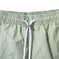 Vente en gros de shorts de ville en nylon de 5 pouces avec cordon de serrage logo réfléchissant personnalisé à bas quantité minimale de commande