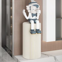 Support de présentation pliable cylindrique en papier kraft pour gâteaux et desserts, idéal pour la décoration de mariage moderne et les événements.