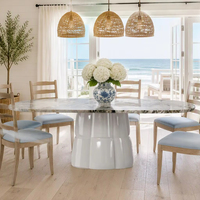 Table à manger ovale de luxe contemporaine avec plateau en marbre, base sur pieds capitonnée et imperméable, mobilier moderne pour la maison