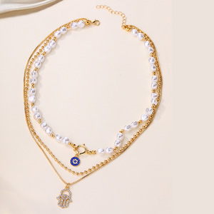 Collar de diamantes de aleación multicapa creativo al por mayor para mujer nuevo colgante de moda con <span class=keywords><strong>ojos</strong></span> de perla y cadena fina - Product Image 2
