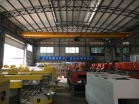 Machine automatique de pliage de semelles thermo-cimentées