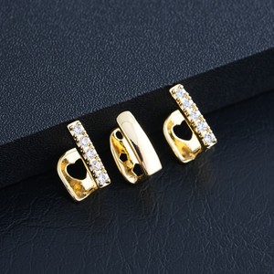Ensemble de trois grillz dorés pour les dents, bijoux de fête avec incrustation de zircon - Product Image 3