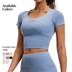 Haut de yoga pour femme en nylon et élasthanne respirant à séchage rapide, à manches courtes, avec coussinets de poitrine, idéal pour la gym, le yoga, la course et le fitness - Product Image 2