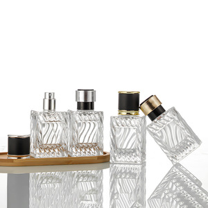 In Stock Water Ripple 50ml Glass Perfume Bottle, Labelable Refillable Fine Mist Spray Bottle - Product Image 1