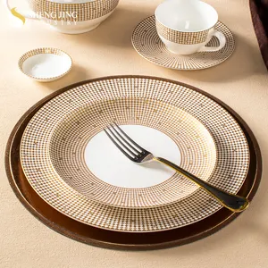 Shengjing Vaisselle en Céramique de Luxe Vente en Gros Porcelaine Osseuse Or Blanc Assiette Principale Plats Traiteur Hôtel Mariage