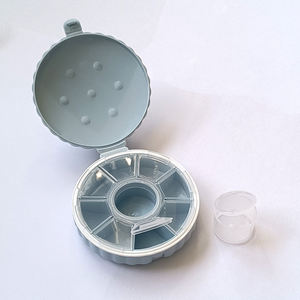 Caja organizadora de pastillas de plástico con forma redonda, 7 días, 8 compartimentos, para uso diario y de viaje - Product Image 1