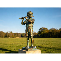 Sculpture de jardin en bronze décorative pour parc extérieur, représentant des enfants assis sur un banc (garçon et fille), moulée en métal, sur mesure.