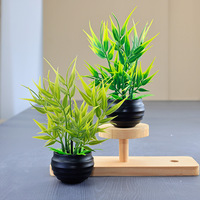 Vente en gros usine : Mini plantes artificielles en pot sans feuilles tombantes, feuilles de bambou, tiges vertes pour la décoration intérieure du salon et de la maison