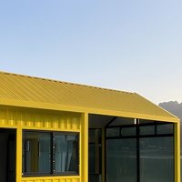 Gelbes Vorgefertigtes Containerhaus 20ft 40ft Einzeleinheit mit Giebeldach Tiny House mit Wintergarten Bezugsfertig
