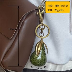 Wholesale Gilded Pear Keychain Elegant Green & Gold Pear Pendant with Triple <b>Leaves</b> Fashionable Bag Charm & Keyring Accessory - Product Image 6