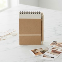 Carnets miniatures de couleur unie en gros pour une utilisation promotionnelle comme cadeaux d'entreprise.