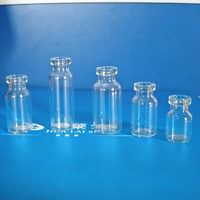 Flacon en verre de 15 ml pour adjuvant vaccinal avec bouchon en caoutchouc pour les opérations de remplissage final en vrac des adjuvants.
