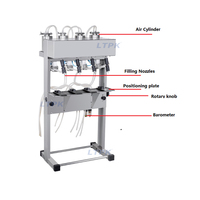 Machine de remplissage sous vide pneumatique de bouteille de parfum cosmétique de parfum d'huile d'olive de 4 buses pour le flacon de parfum de whisky de liqueur