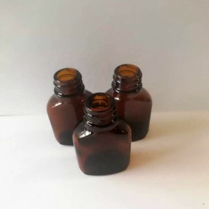 Botella de Vidrio Ámbar Plana de 10 ml con Serigrafía y Tapa con Pincel - Product Image 2