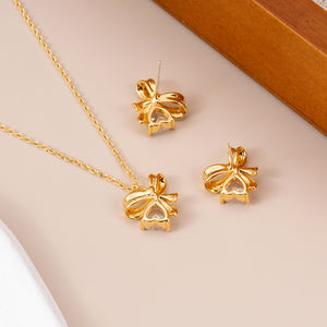 कस्टम गोल्ड प्लेटेड डायमंड हार्ट धनुष बालियां के नेकलेस ने पीतल लिंक चेन से बनी महिलाओं के लिए नई फैशन क्लासिक शैली के गहने सेट किए - Product Image 2