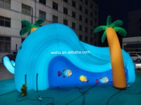 Mur de poissons tropicaux gonflables avec éclairage LED pour la décoration de fête sur le thème marin