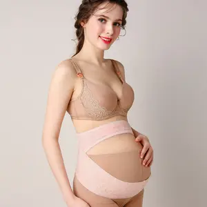 Schwangerschaft frauen verwenden einen weichen, verstellbaren, elastischen Mutterschaft gürtel für den umwelt freundlichen Freund zum Schlafen