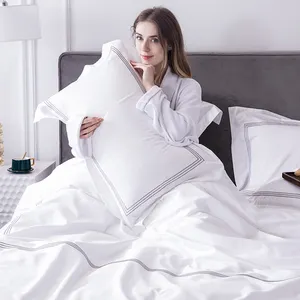Hotel de cinco estrellas al por mayor 100% algodón ropa de cama de lujo hoja blanco hoja de cama para Hotel cubierta del edredón barato bordado lino
