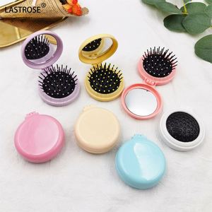 LASTROSE 2-in-1 Round Folding Air Cushion Comb Set with Mirror Design 3 Colors Plastic & Glass Portable <b>Makeup</b> <b>Tools</b> - Product Image 1