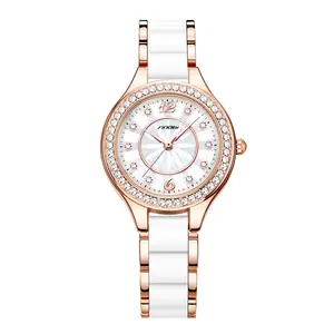 Женские наручные часы с кристаллами