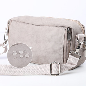 Bolso cruzado multifuncional de nailon con forma de cubo para cosméticos y documentos, bolso de pecho para hombre - Product Image 3