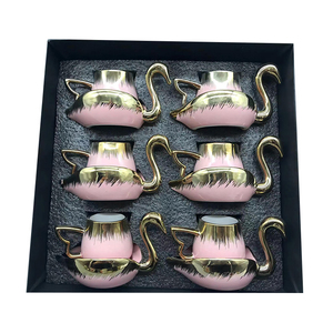 Ensemble de tasses à thé et soucoupes en porcelaine de luxe 90cc en gros, bord doré, forme de cygne, vaisselle en céramique pour fête, ensemble de tasses à café de 6 pièces - Product Image 1