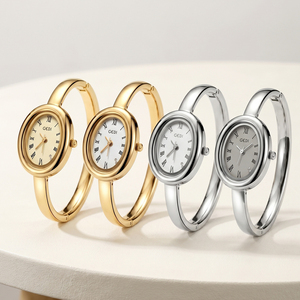 Vintage Oval Gold <b>Bangle</b> Watch for Women with Roman Numerals Diamond Set Dial Integrated Quartz Watch - Product Image 2