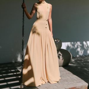 เดรสยาวผู้หญิงแบบเรียบหรูมีสไตล์ แขนกุด กระดุมโลหะ เหมาะสำหรับใส่ในชีวิตประจำวัน ขายส่งจากโรงงาน - Product Image 1