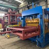 Machine à blocs de béton hydraulique QT10-15 pour blocs creux, pleins et de pavage