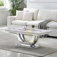 Table basse moderne en marbre doré de qualité supérieure avec structure en acier inoxydable, design populaire pour salon