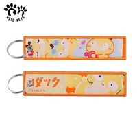 Logo personnalisé promotionnel imprimé Anime Double face tissé tissu brodé clé Jet Tag broderie porte-clés porte-clés porte-clés