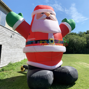 Grand Père Noël gonflable géant qui sort du cheminée pour la fête de Noël en plein air dans la cour. - Product Image 5