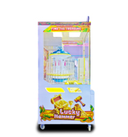 Offre Spéciale distributeur automatique à jetons Lucky Hammer Prize Gift Machine pour Mall Parks Token Game Machine