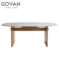 Table à manger ovale de style nordique avec pieds en bois de frêne et plateau en marbre pour usage domestique et commercial, capacité 6 personnes