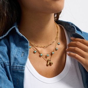 Collier en acier inoxydable doré avec breloques fleurs en turquoise bleue pour un usage quotidien - Product Image 3
