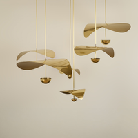Lustre suspendu LED en laiton sculptural minimaliste italien moderne pour salon, salle à manger, villa, escalier, hôtel, décoration