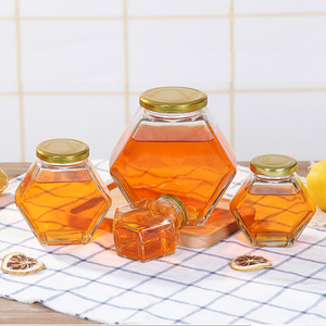 Bouteille de stockage des aliments, conteneur en verre hexagone avec couvercle métallique, pot de miel en verre, vente en gros 1 pièce