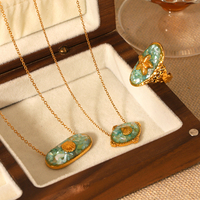 Parure de bijoux pour femme en acier inoxydable plaqué or 18 carats, avec pendentif coquillage craquelé et bague ouverte étoile de mer, idéale pour les vacances à la mer